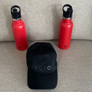 Peloton Black Hat and Vibrant Red Bottles